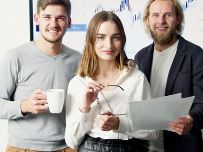 Investment professionals collaborating on project strategy